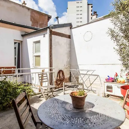 Family With A Rooftop Near Menilmontant *